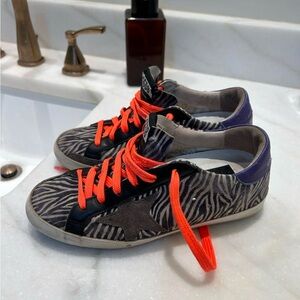 Golden Goose Zebra Print Sneakers with Orange Laces